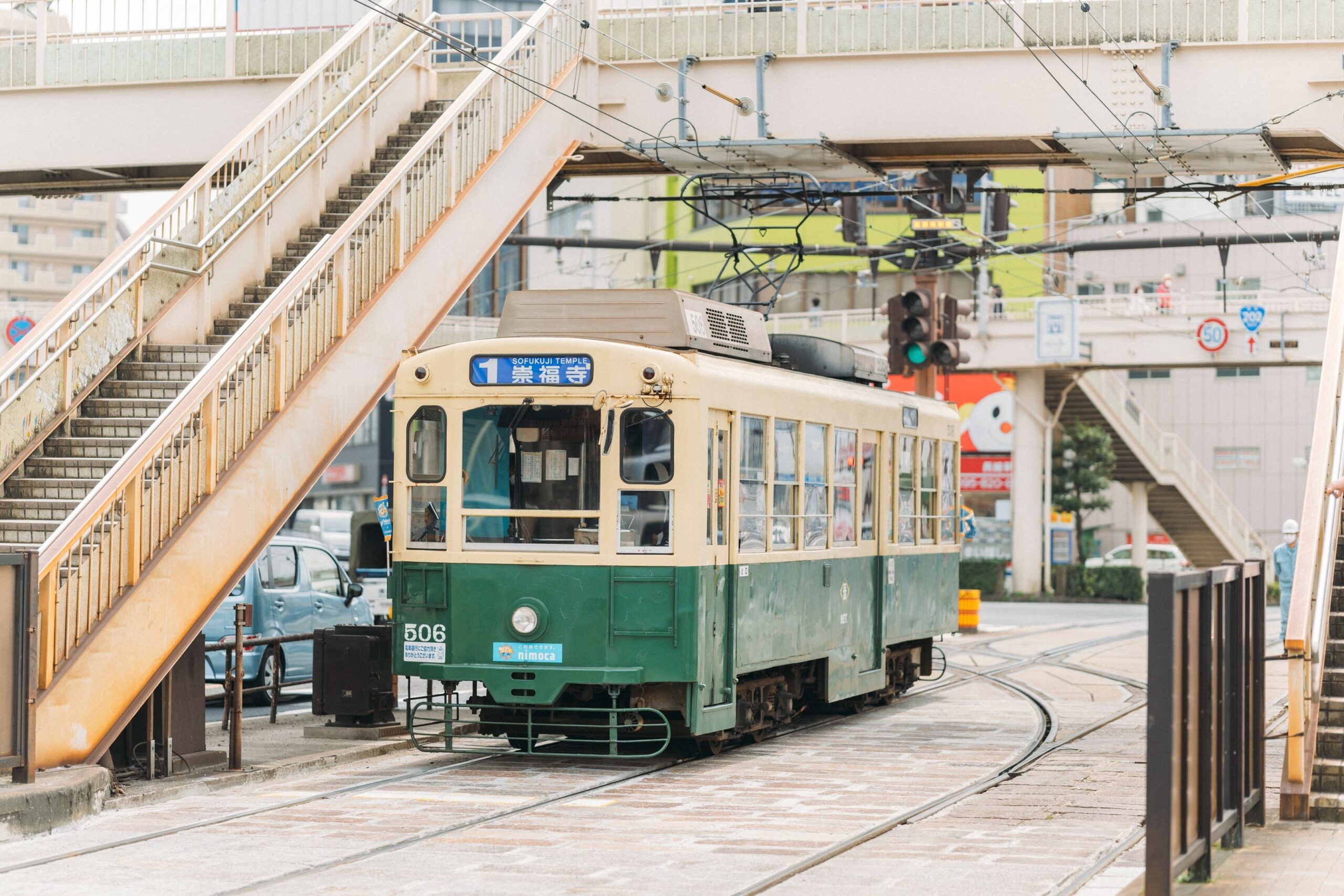 Modern Nagasaki streetcar in operation, connecting major sightseeing areas and daily life in the cit