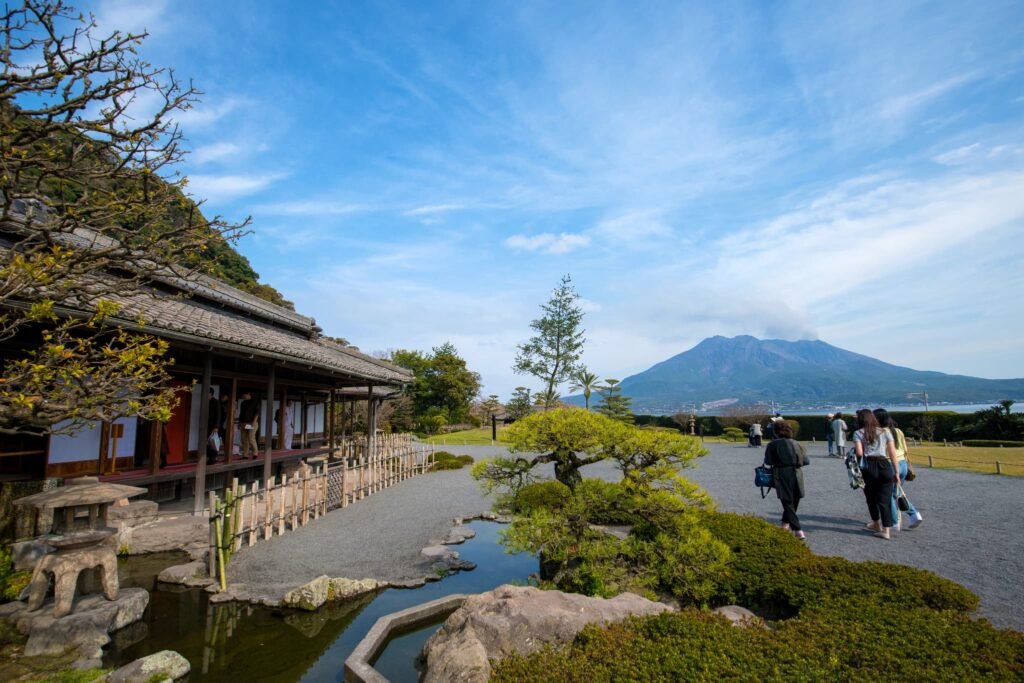 Sengan-en Garden in Kagoshima with Sakurajima volcano rising across Kagoshima Bay, one of Japan's most scenic historic gardens.