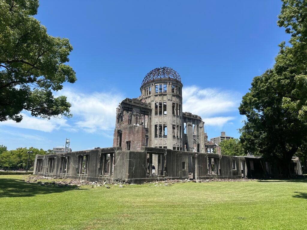 Hiroshima Atomic Bomb Dome, a UNESCO World Heritage Site and symbol of peace, standing beside the Motoyasu River in Hiroshima, Japan.